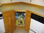 SW corner, lower cabinets with lazy susan