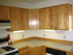 Cabinets SW corner.  They are on all walls in kitchen